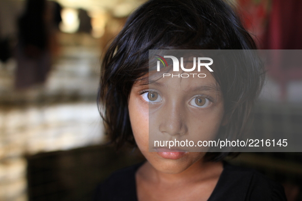  A portrait of Myanmar’s Rohingya girl, who fled from country’s ongoing military operations in Rakhine state, take sheltered at a refugee ca...