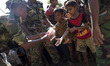 Bangladesh army soldier distribute relief to Rohingya refugees at Thankhali refugee camp i...