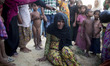 A Rohingya refugee women mourn after lost her father today at Thankhali refugee camp in Te...