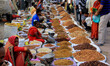 Vendors selling Dry Fruits in a market at Old Delhi, India, 8 October 2017. 
