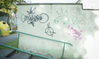 An anarchy logo is seen spray painted on a wall in a residential neighbourhood on October...