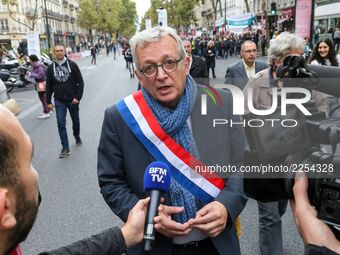 French Communist Party (PCF) national secretary Pierre Laurent (C) speaks with press during a demonstration in Paris, France, on October 10,...