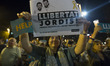 Thousands of protesters protest the imprisonment of Catalan independentist leaders Jordi S...