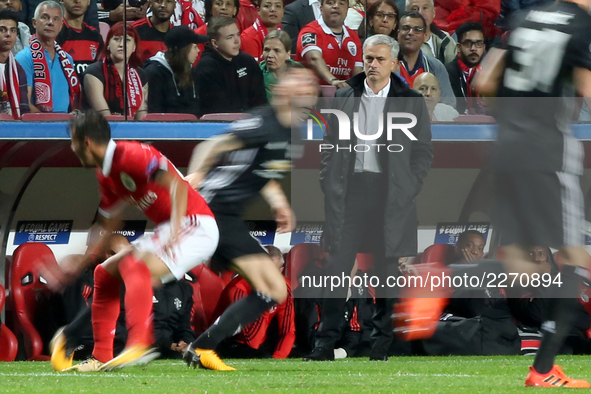 Manchester United's Portuguese head coach Jose Mourinho looks on during the UEFA Champions League football match SL Benfica vs Manchester Un...