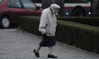 An elderly woman is seen walking towards the St Vincent de Paul basilica in Bydgoszcz, Pol...