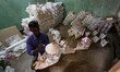 Traditional artists preparing fancy boats at their living house before supply it to the ma...