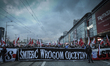Demonstrators carrying a banner with "Death to Enemies of the Homeland" await the start of...