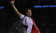 Roger Federer of Switzerland gives the thumbs up to the fans after being defeated by David...