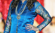 Woman models an elegant Indian outfit during a fashion show held as part of the Diwali Gal...