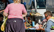 KIEV, UKRAINE - SEPTEMBER 4: Woman tries to buy American dollars from a street moneychange...