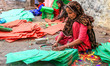 An Indian muslim women kite makers makes paper kites ahead the Hindu Makarsakranti Festiva...