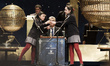 Pupils of the San Ildefonso school sing out a winning number during the draw of Spain's Ch...