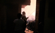 A firefighter tries to contain a major fire that hit a slum located in the Campo Belo neig...