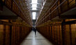 Tourists walk through the main cells corridor at Alcatraz Federal Penitentiary located in...