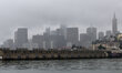 The fog covered Financial District of San Francisco, California is seen from the San Franc...