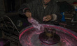 Ghulam Muhammad Bhat makes cotton candy or candy floss on his  his typical machine, inside...