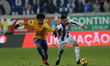Estorils forward Allano from Brazil fights for the ball with Porto's Brazilian defender Al...