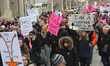 Hundreds take part in the Women's March in downtown Toronto, Canada, on January 20, 2018. 