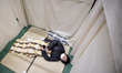A foreign resident tries out the experience what it's like inside a shelter during the Dis...