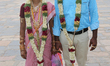 Tamil Hindu couple poses for a photo after just being married at the Nataraja Temple in Ch...