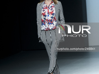 A model walks the runway in the Juan Vidal fashion show during the Mercedes Benz Fashion Week Madrid Spring/Summer 2015 at Ifema on Septembe...