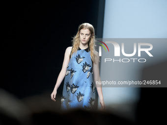 A model walks the runway in the Juan Vidal fashion show during the Mercedes Benz Fashion Week Madrid Spring/Summer 2015 at Ifema on Septembe...