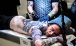 A man gets tattooed during the 23th Milano Tattoo Convention held Milan, Italy on February...