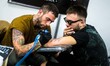 A man gets tattooed during the 23th Milano Tattoo Convention held Milan, Italy on February...