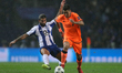 Roberto Firmino forward of Liverpool in action with Porto's Portuguese midfielder Sergio O...
