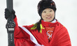 Zhang Xin of China reacts after finishing ladies' aerials of freestyle skiing at 2018 Pyeo...