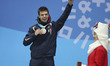 Third-placed Nicola Tumolero of Italy celebrates during medal ceremony of men's 10000m eve...