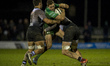Craig Ronaldson of Connacht tackled by Renato Giammarioli and Georgr Biagi of Zebre during...