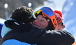 Switzerland's Sarah Hoefflin (R) celebrates after the women's ski slopestyle of freestyle...