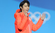 Gold medalist Yuzuru Hanyu of Japan reacts during medal ceremony of men's single skating o...
