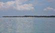 View of the village and trees along the water seen from Kurikadduvan Harbour in Northern S...