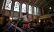 Residents occupy a church converted into an evacuation center after their homes were swamp...