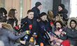 MP Nadia Savchenko talks to media representatives before the questioning at Security Servi...
