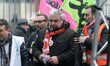 General secretary of CFDT Railway union Didier Aubert (C) attends a demonstration in front...