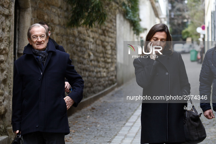 Arrive at Sarkozy's house a day after he was charged on corruption 