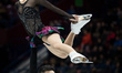 Peng Cheng (Top) and Jin Yang of China perform during the pairs free skating competition a...