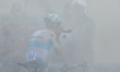 Bakhtiyar Kozhatayev from Astana Pro Team enjoys the water curtain at the finish line of t...