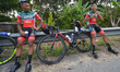 Members of 7 Eleven-Cliqq Roadbike Philippines at the finish line of the sixth stage, the...