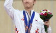 (140924) -- INCHEON, Sept. 24, 2014 () -- Kim Junhong of South Korea poses during the awar...