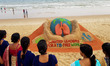 A sand sculpture is seen at the Bay of Bengal Sea's eastern cost beach at Puri as it is cr...