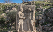 A stone relief of Antiochus I shaking hands with Hercules in Arsameia, an ancient city loc...