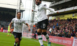 Liverpool's Mohamed Salah celebrates scoring his sides second goal during the Premiership...