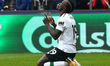 Liverpool's Sadio Mane celebrates scoring his sides first goal during the Premiership Lea...