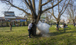  Kashmiri Muslims save themselves from the teargas shells of  Indian government forces fir...