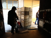 Gdansk, Poland 25th, September 2014
Polish Red Cross magazine in Gdansk. Workers unload transport of apples from manufacturers from Gora Kal...