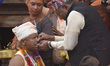 A priest tongue piercing 46 yrs old, Buddha Krishna Shrestha by an iron needle as part of...